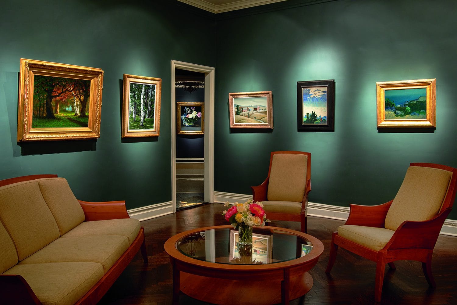 Questroyal Fine Art gallery showroom. Bierstadt, Lucioni, Tarbell, Madearis, Burchfield, Bellows, landscape paintings